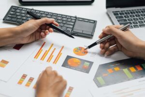 Financial Advisory Meeting Analyzing Business Investment Strategy and Marketing Planning